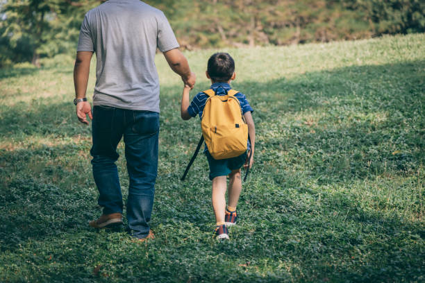 istock Father play with kid outdoor 1288962082