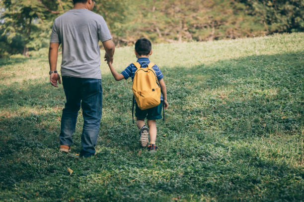 istock Father play with kid outdoor 1288962102