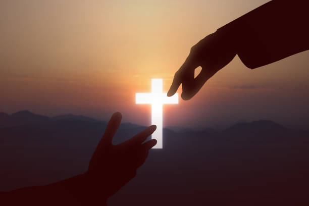 istock Jesus Christ giving a helping hand to human 1288962121