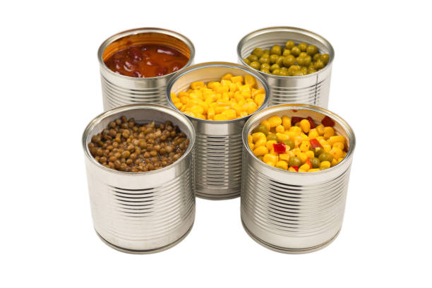 istock Canned food on white background. Green pea, beans, corn, lentils. 1288965482