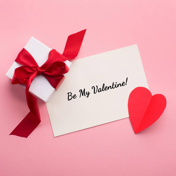 istock Valentines gift boxes, red bow and felt hearts 1288967348
