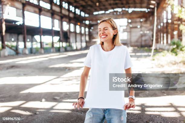 Stylish Blonde Girl Wearing White Tshirt And Glasses Stock Photo - Download Image Now