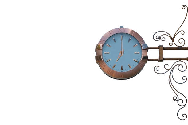 istock Street clock isolated on white background. Classic style streeet clock. 1288972402