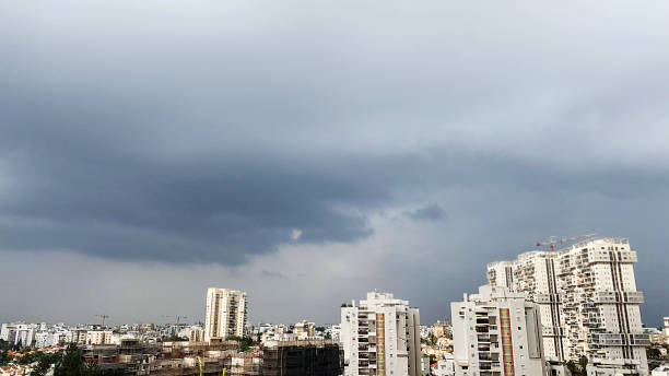 istock Cloudy sky over the city. the storm is coming 1288974943