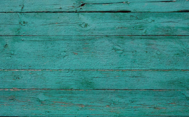 istock Old green wooden planks background. 1288976440