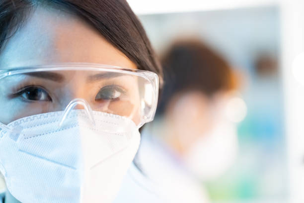 istock Asian scientist look at you 1288977691