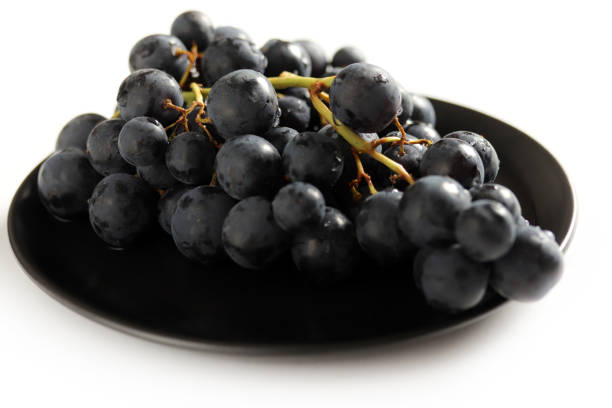 Fresh dark red grapes close up