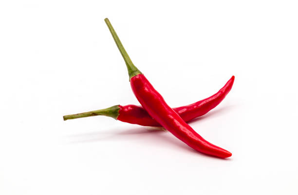 istock Fresh chili pepper isolated on white background. Close up red chili. 1288979829