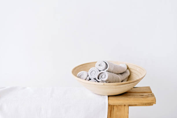 istock Modern spa and bathroom interior concept, relaxing decor. Clean towels. Soft selective focus. Copy space 1288980174