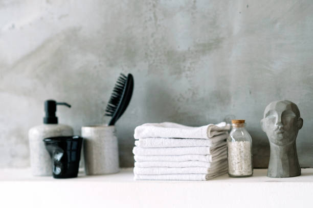 istock Modern spa and bathroom interior concept, relaxing decor. Clean white towels. Soft selective focus. 1288980183