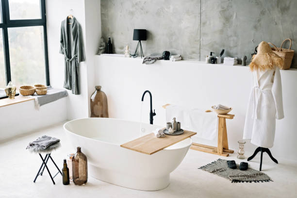 istock White modern bath in contemporary apartment with stylish loft style interior design, home decor. Soft selective focus. 1288980201