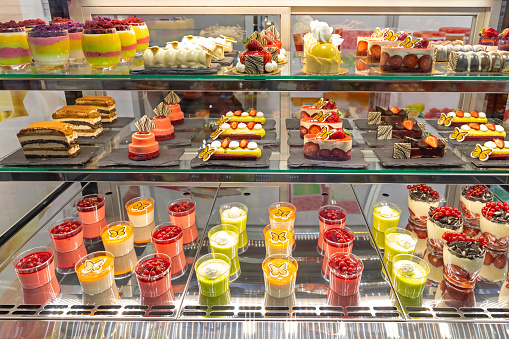 Assortment of Pastries and Cakes in Patisserie Display