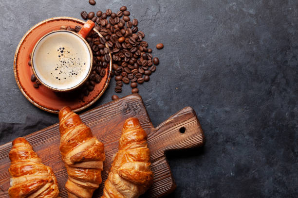 istock Espresso coffee and croissants for breakfast 1288992590