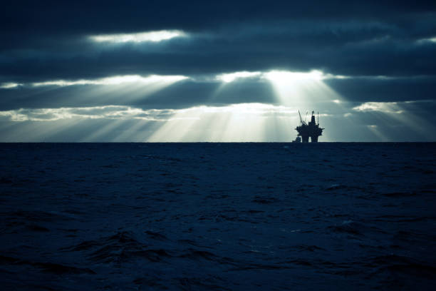 Industrial oil rig offshore platform construction site on the North Sea coast Industrial oil rig offshore platform construction site on the North Seacoast north sea oil and gas stock pictures, royalty-free photos & images