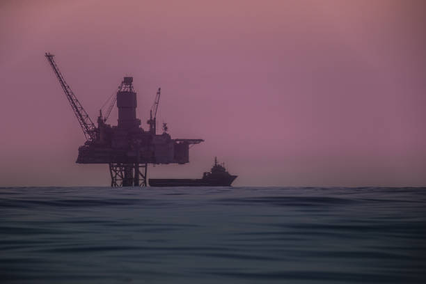 Industrial oil rig offshore platform construction site on the North Sea coast Industrial oil rig offshore platform construction site on the North Seacoast north sea oil and gas stock pictures, royalty-free photos & images