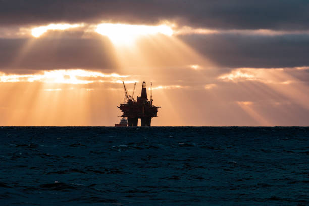 istock Industrial oil rig offshore platform: away from a sustainable resource 1288994441