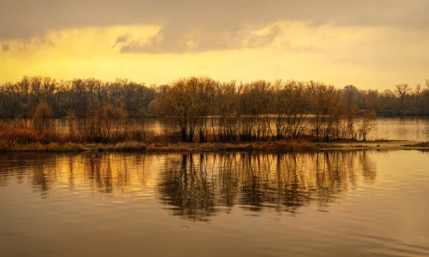 istock Island on the river in winter. Cold bright sunrise 1288995899