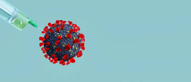 istock Coronavirus Vaccine and Syringe , healing disease concept background 1288995901