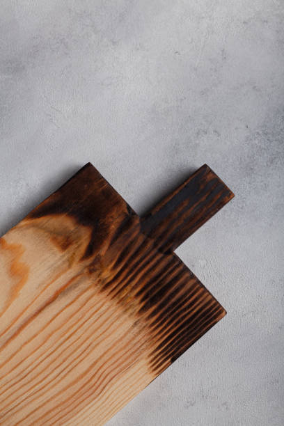 istock Wooden board on white background 1288996304