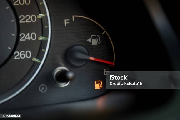 Empty Fuel Warning Light In Car Dashboard Fuel Pump Icon Gasoline Gauge Dash Board In Car With Digital Warning Sign Of Run Out Of Fuel Turn On Low Level Of Fuel Show On Speedometer Dashboard Stock Photo - Download Image Now