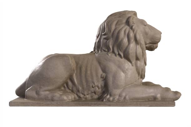 istock 3D render of lying lion stone sculpture isolated on white 1289000677