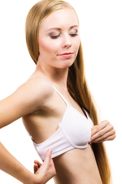 istock Woman wearing too big bra 1289000980