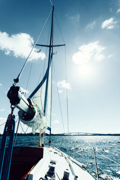 istock Yachting on sail boat during sunny weather 1289003679