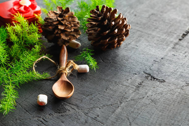 istock Wooden spoon and pine tree background Christmas background concept 1289004017