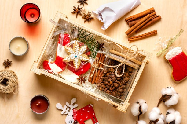 istock care package, seasonal gift box with coffee, gingerbread and cinnamon Personalized eco friendly basket for family, friends for thankgiving, christmas, mothers, fathers day Flat lay 1289008213