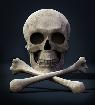 Skull and bones on black background.