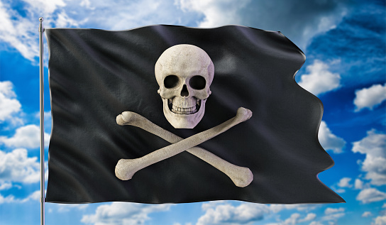 Skull and bones on black waving pirate flag.