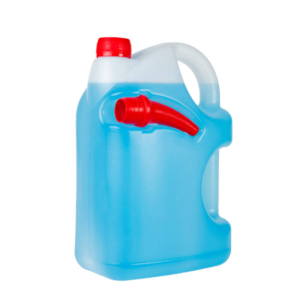 istock Blue windshield washer fluid in canister isolated on white background. Antifreeze for car screen wash 1289013585