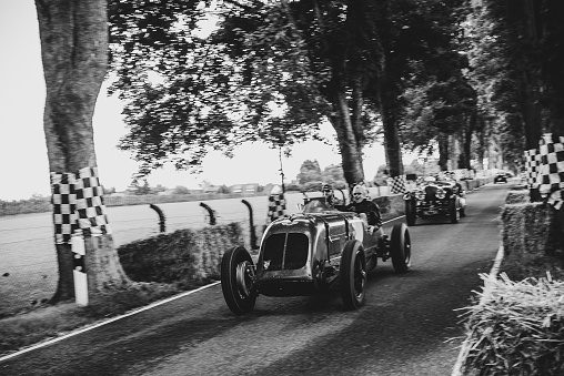 URBINO, ITALY - JUN 16 - 2022 : RALLY ABC 1100 1928 on an old racing car in rally Mille Miglia 2022 the famous italian historical race (1927-1957)