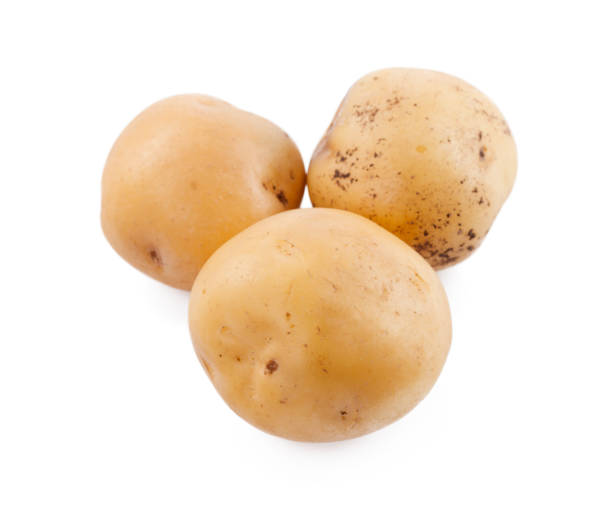 istock raw yellow potato isolated on white background 1289014096