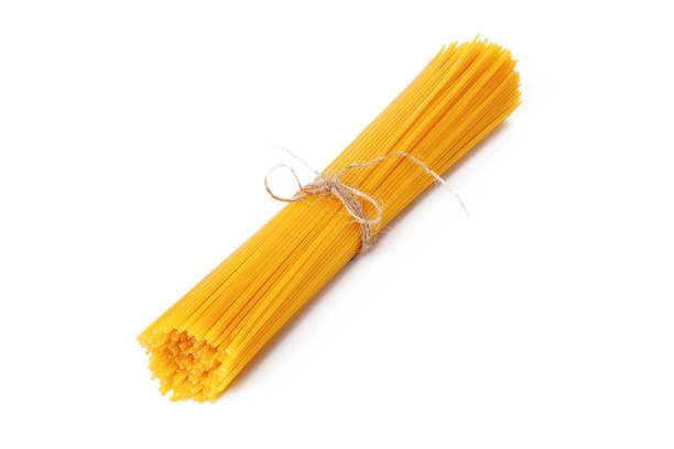 istock pasta on white background close up. creative photo. 1289014824