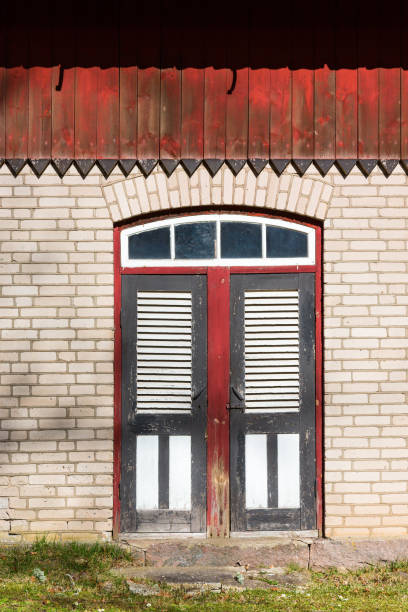 istock Door into the old barn 1289015182