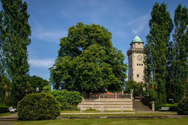 Both an garden and an architectural monumet: the "Ludolfingerplatz" with the tower of former casino in Berlin-Frohnau stock photo
