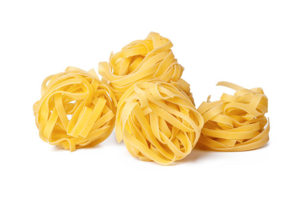 istock pasta on white background. close up. creative photo. 1289017215