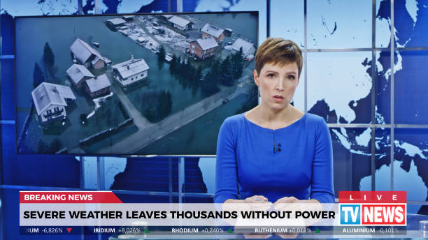 istock Female anchor presenting breaking news about severe weather causing power outage 1289018034