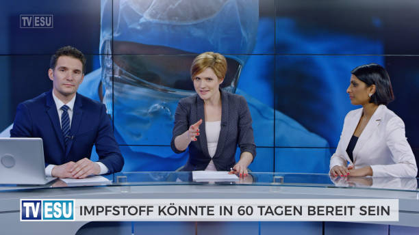 istock Anchors and co-anchor discussing about vaccine accessibility 1289018036
