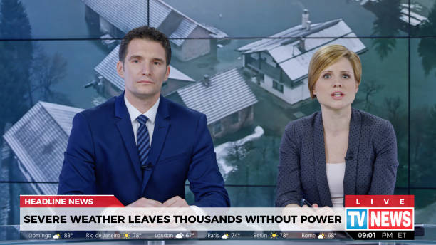 istock Anchors presenting breaking news about severe weather causing power outage 1289018067