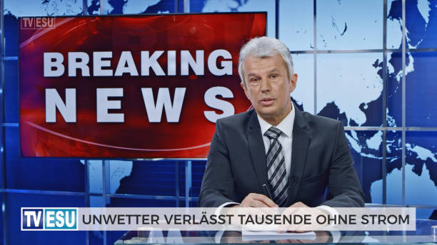 istock Male anchor presenting breaking news about severe weather causing power outage 1289018118