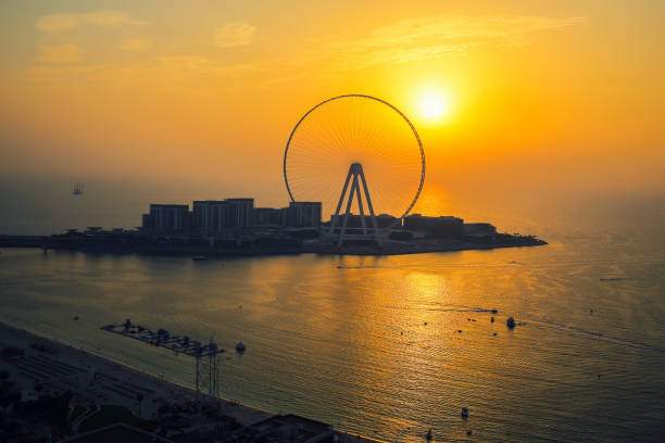 istock Dubai, UAE - 08.17.2020: Dubai eye ferris observation wheel silhouette 1289018527