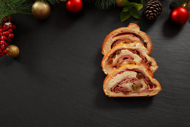 istock Venezuelan Cuisine Ham and Olive wrapped Bread Cake Pan de Jamon 1289020840