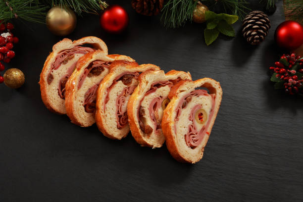 istock Venezuelan Cuisine Ham and Olive wrapped Bread Cake Pan de Jamon 1289020866