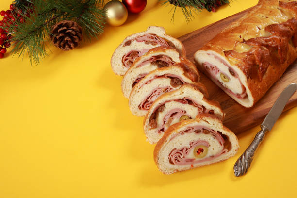 istock Venezuelan Cuisine Ham and Olive wrapped Bread Cake Pan de Jamon 1289020915