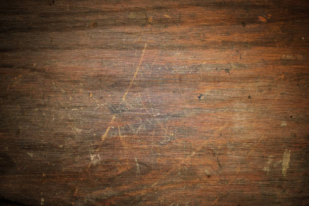 istock Scratched and Worn Aged Wood Background 1289021560