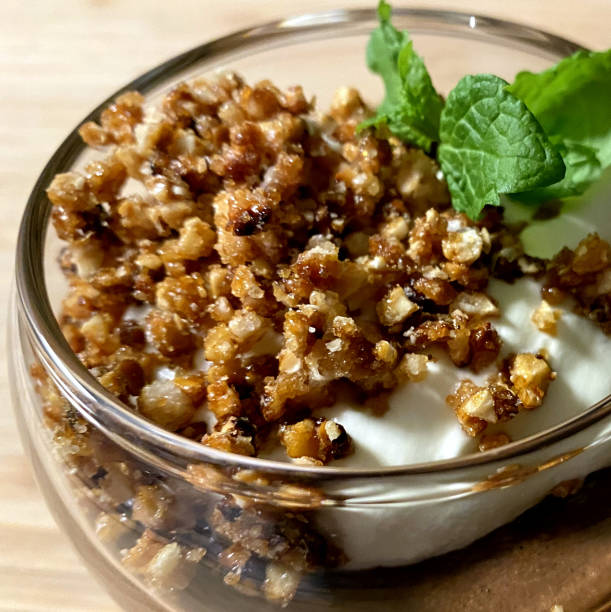 Home made chocolate mousse with crumb and mint leaf