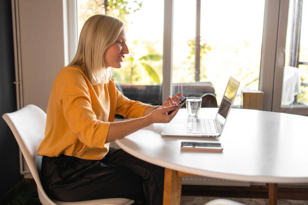 istock Young woman working from home 1289022750