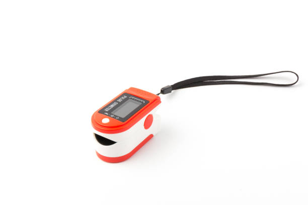 istock Pulse Oximeter, finger digital device to measure oxygen saturation in blood. Coronavirus symptoms concept. 1289025595